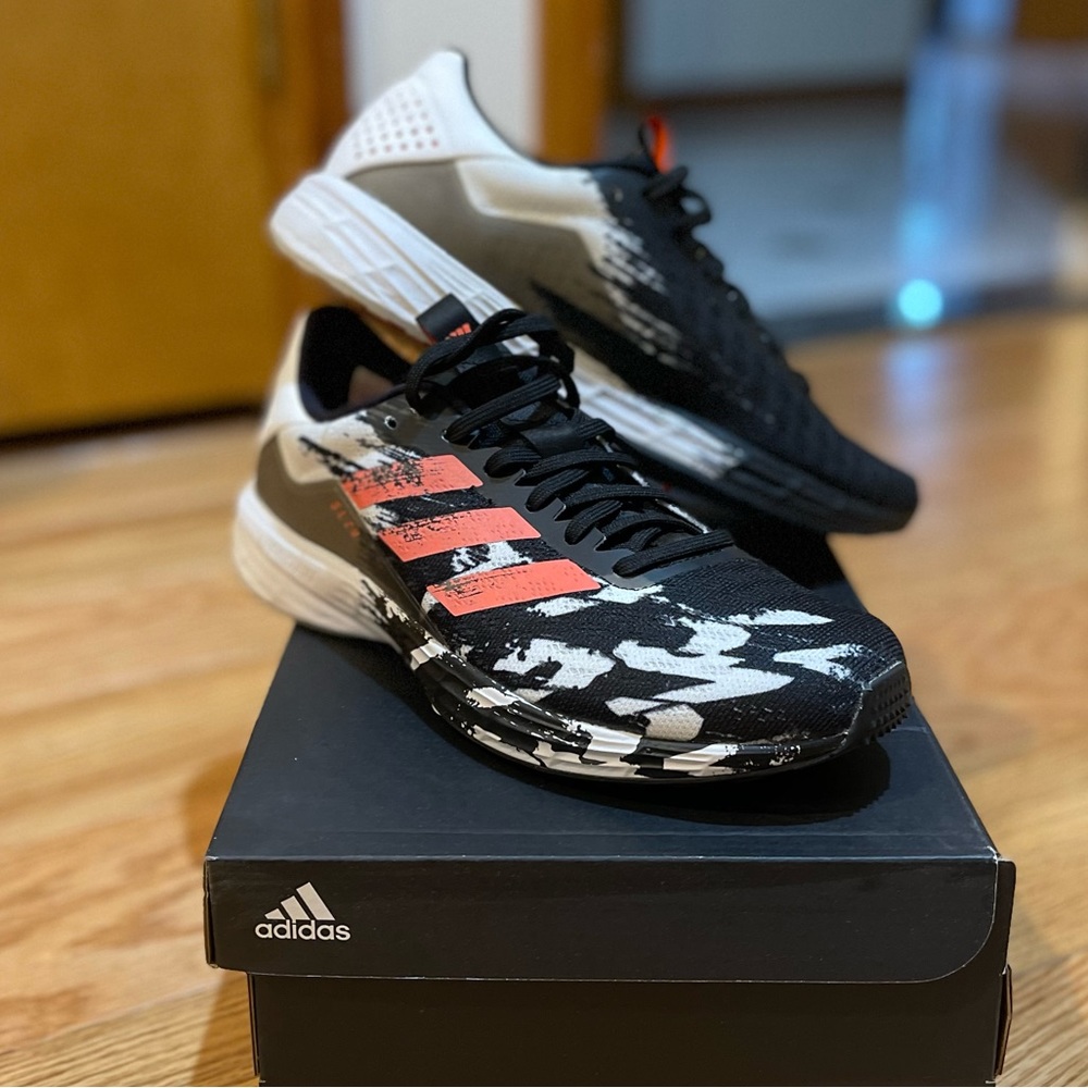Adidas black and coral sneakers. Size: 8.5